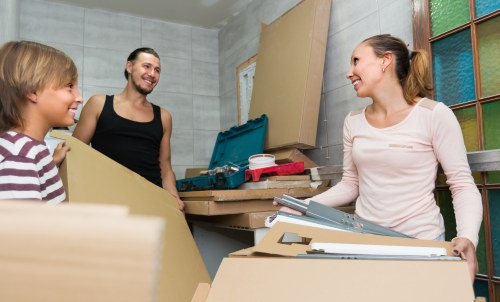 Professional removals team planning a Greenwich house move near local streets