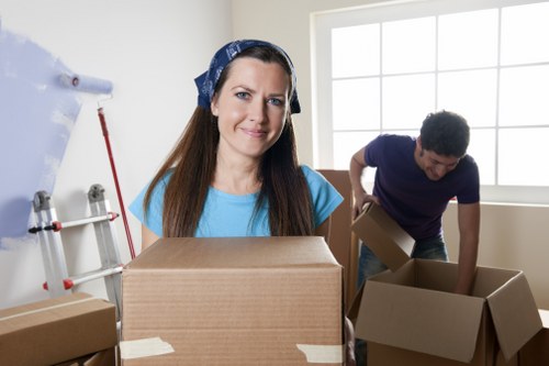 Packed boxes and furniture ready for flat removals in Greenwich