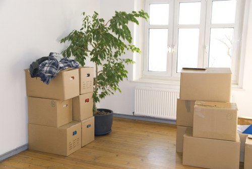 Careful loading of household items for a Greenwich apartment relocation